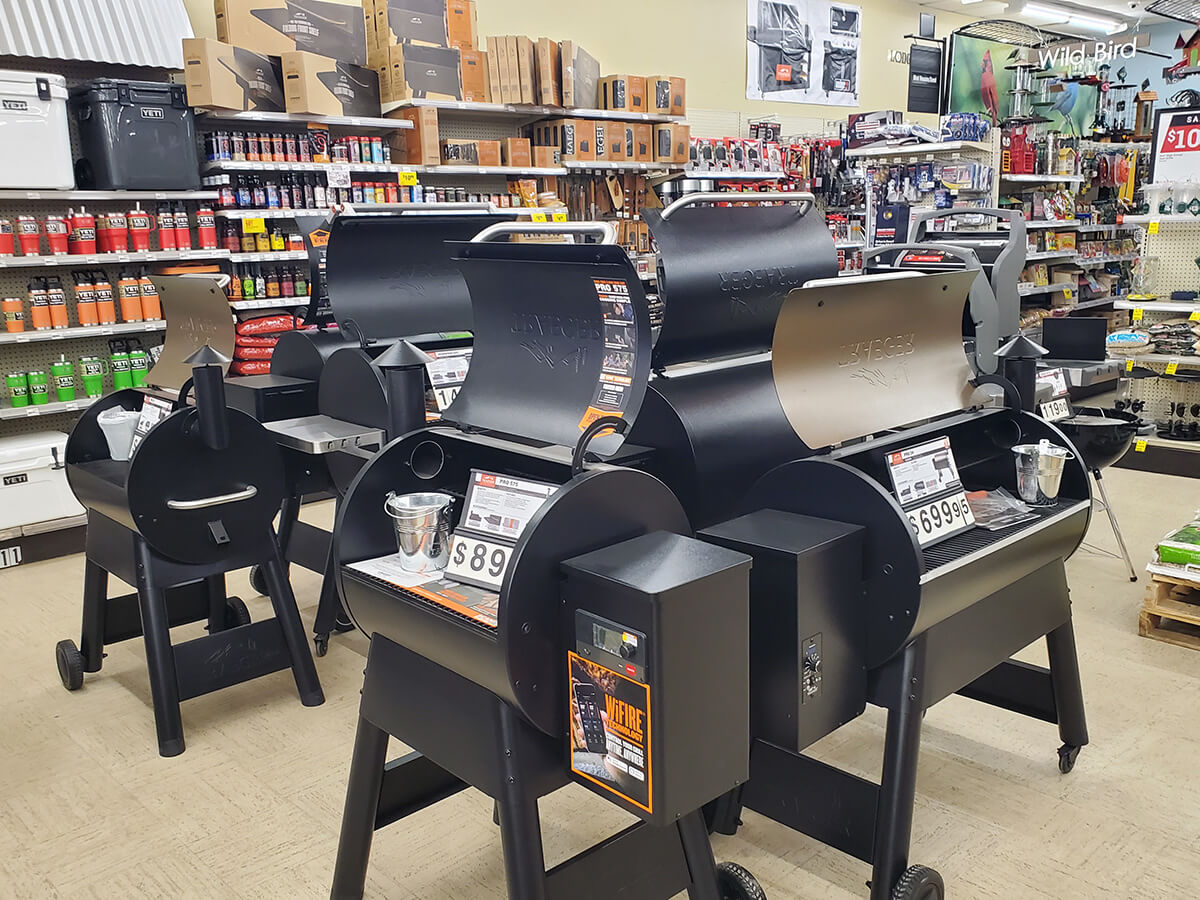 Assortment of Traeger Grills on Display at Byrum Ace Hardware in Charlotte, Offering a Variety of High-Quality Barbecue Grills for Outdoor Cooking Enthusiasts